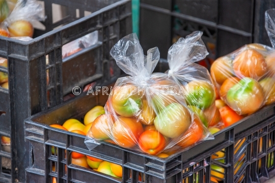 tomatoes in plastic bags