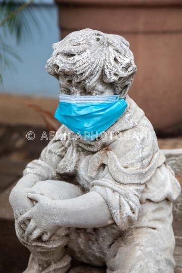 statue face covered