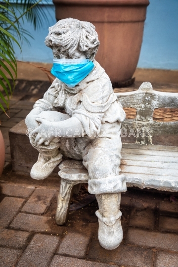 statue face covered