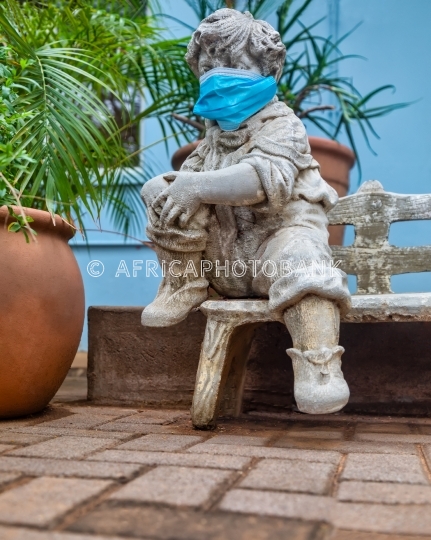 statue face covered