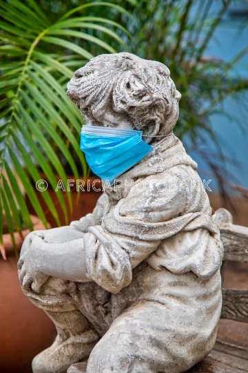 statue face covered