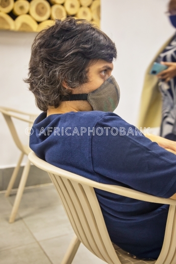 young man in waiting room
