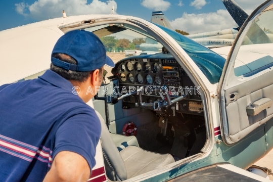 pilot going in the cockpit