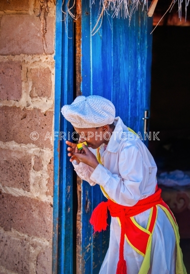 woman snuffing tobacco