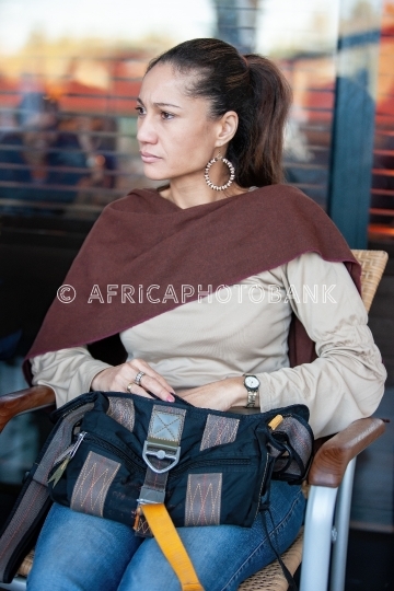 woman searching in her bag