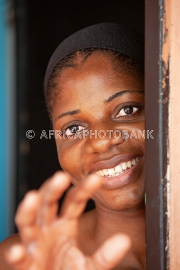 African woman in the door