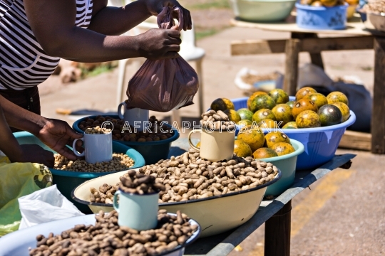 african street vendors selling traditional food