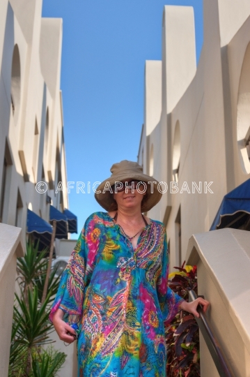 Pacific Ocean woman on the stairs of a terrace