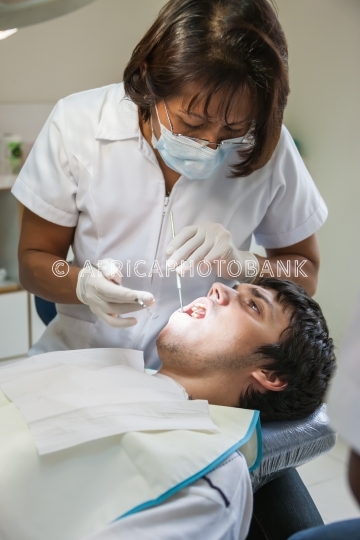 Young man at the dentist